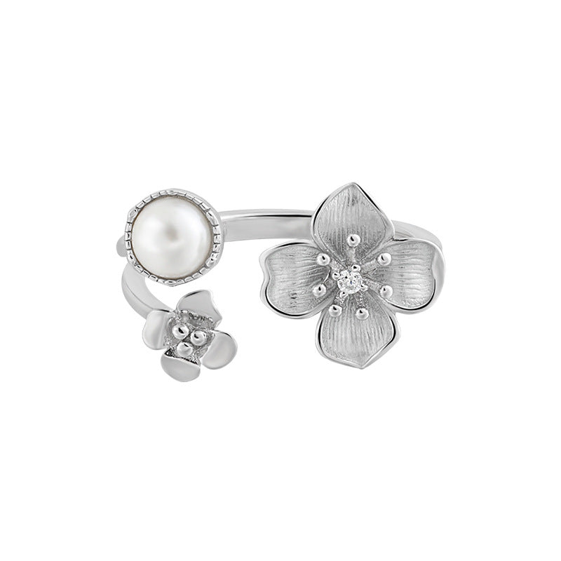 Pearls over flowers ring