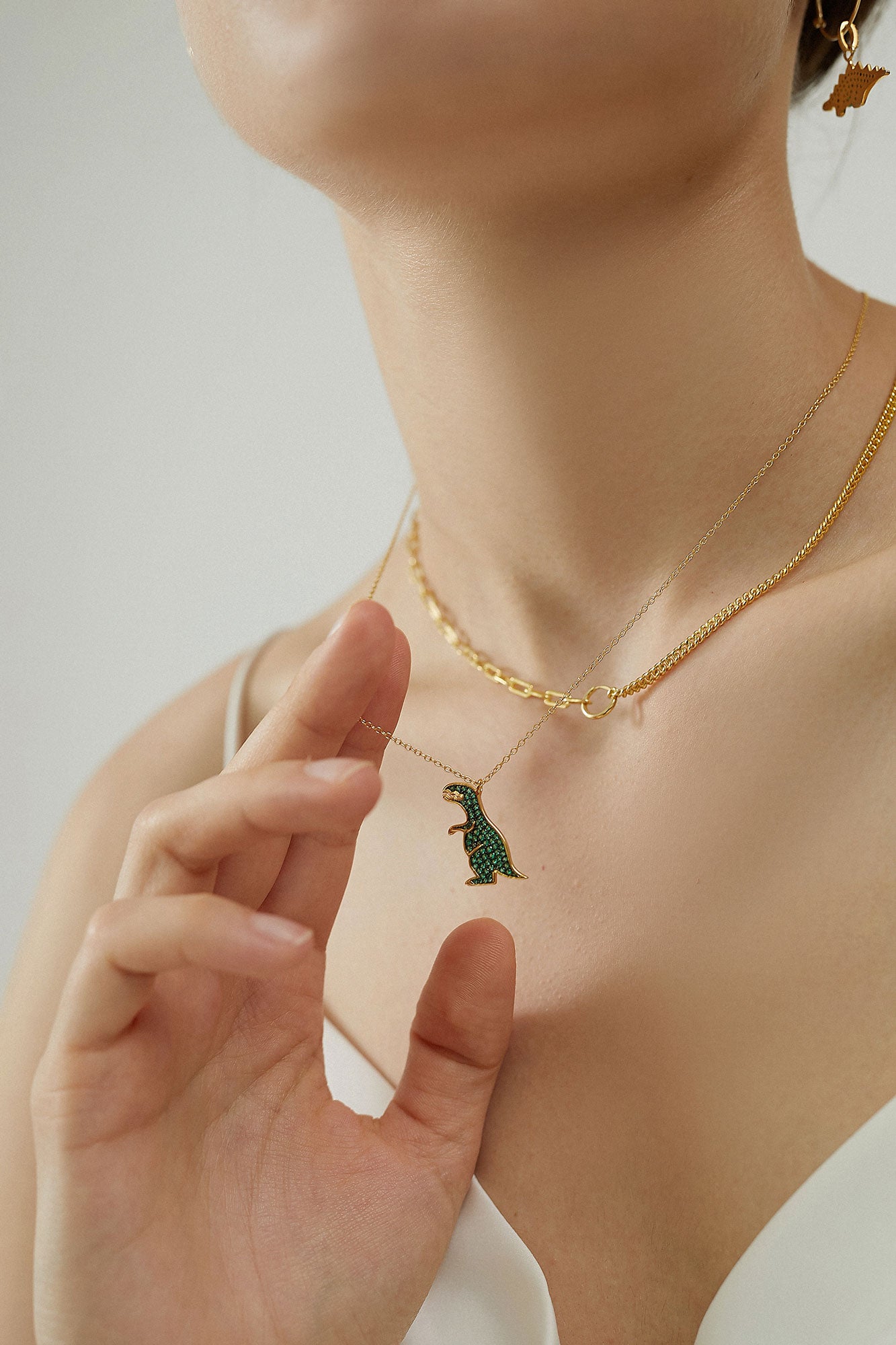 The playful Dinosaur Gold Necklace