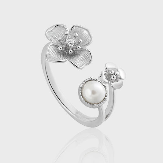 Pearls over flowers ring