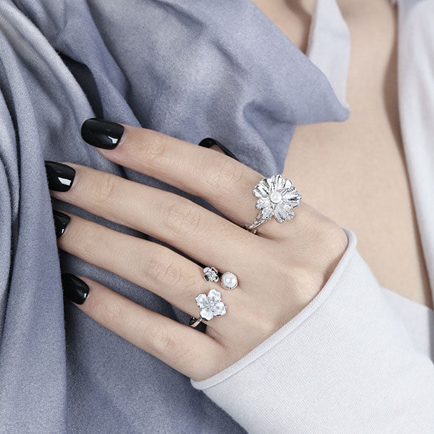 Pearls over flowers ring
