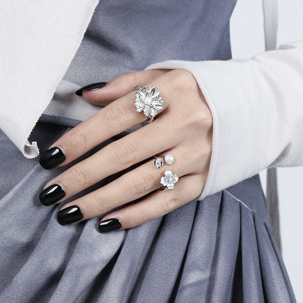 Pearls over flowers ring